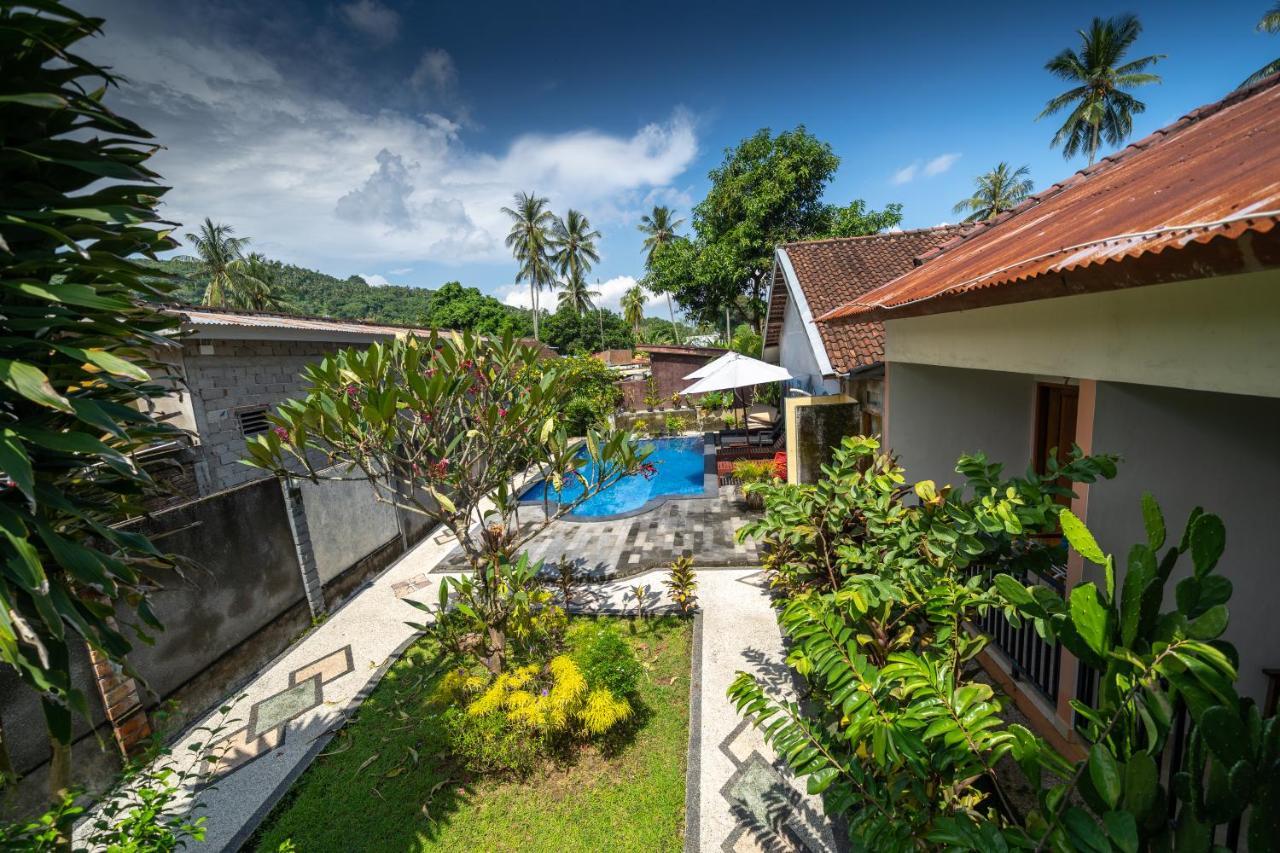 Family Garden Homestay Сенггиги Экстерьер фото
