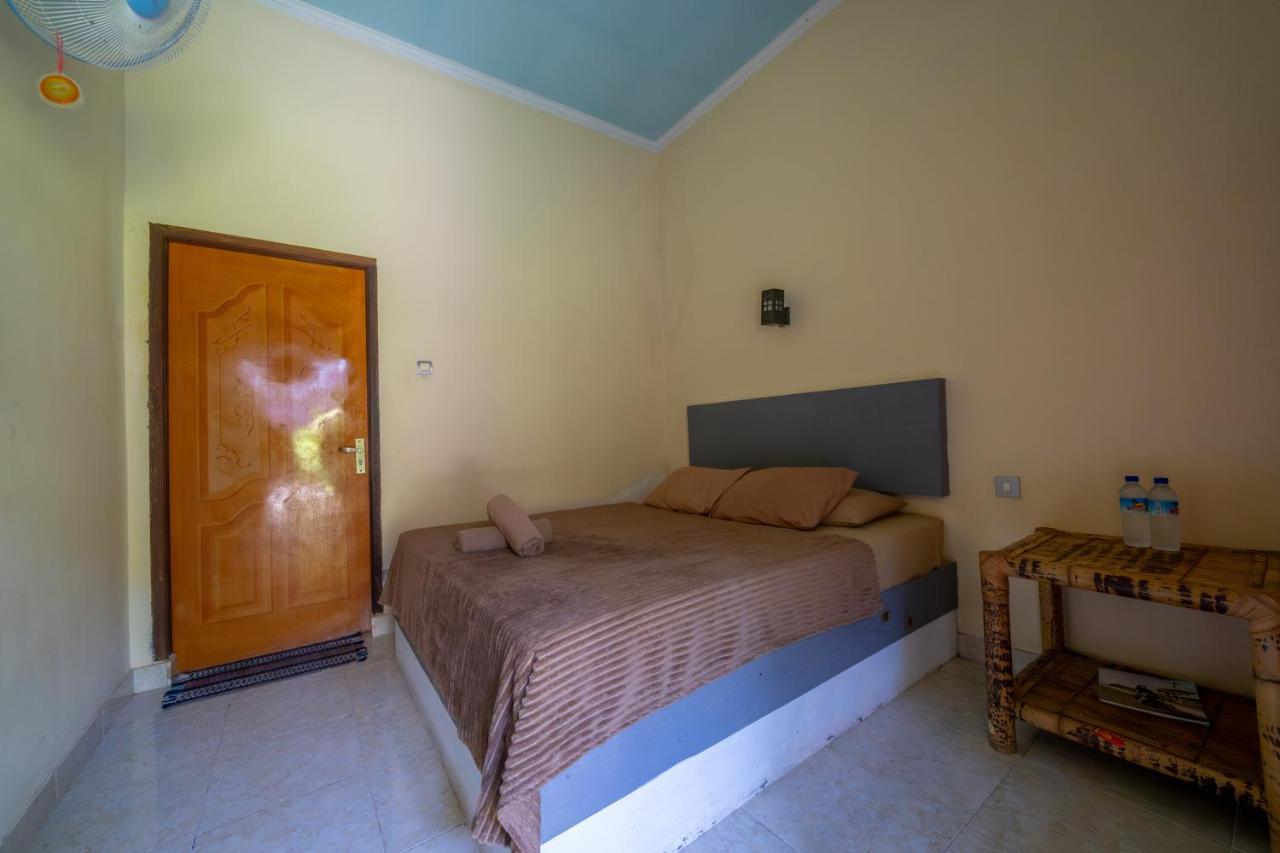 Family Garden Homestay Сенггиги Экстерьер фото