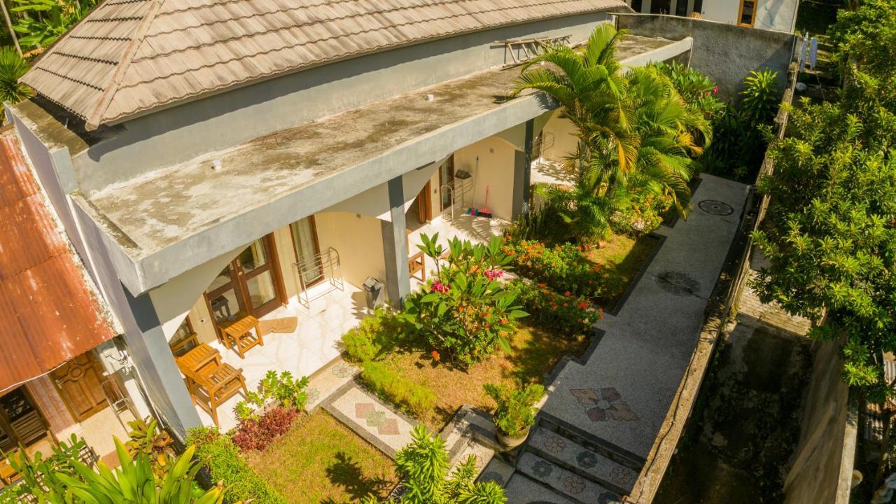 Family Garden Homestay Сенггиги Экстерьер фото